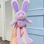 Poupée lapin en peluche